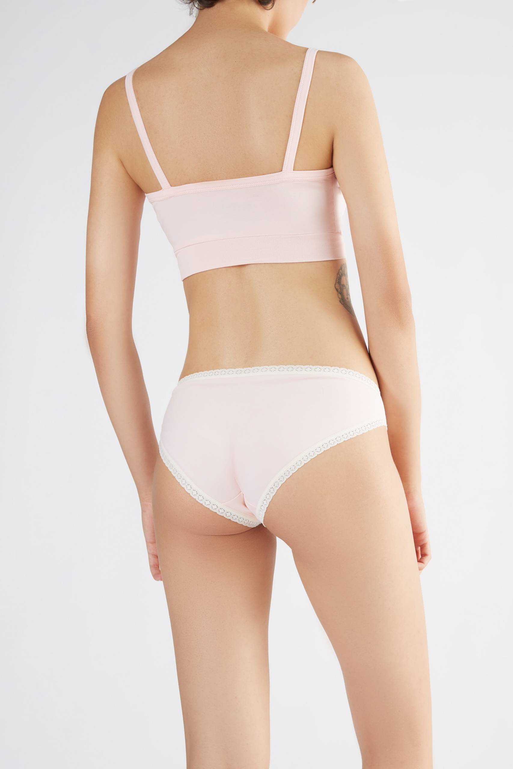 Women's briefs with lace detailing, made from organic cotton, shown on a white background. Stylish and eco-friendly lingerie from True North 1111-036