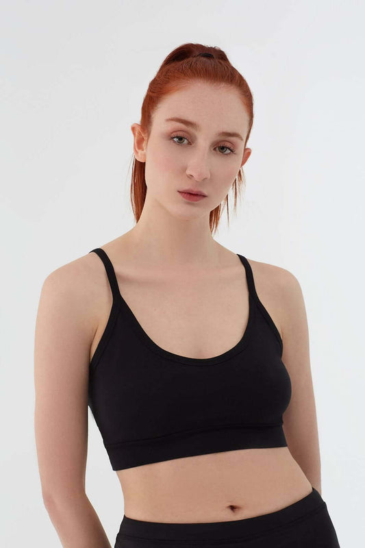 Women's bra with a supportive band, made from organic materials, shown on a plain background. Comfortable and eco-friendly lingerie from True North. 1511-01