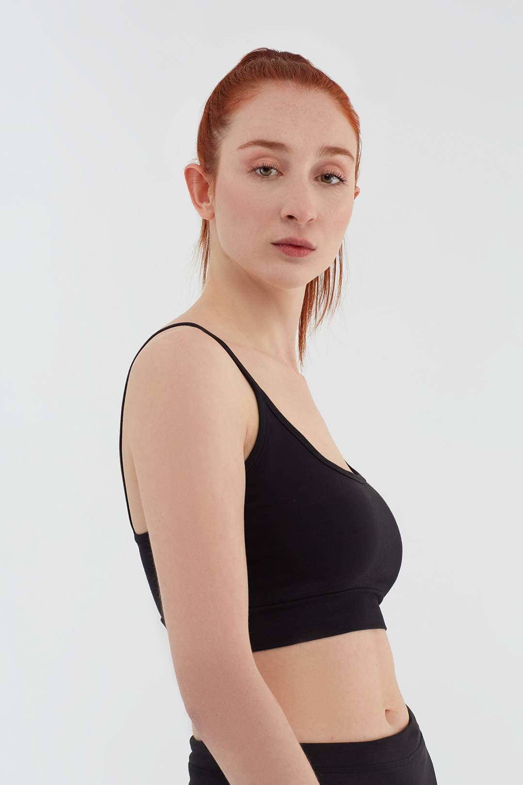 Women's bra with a supportive band, made from organic materials, shown on a plain background. Comfortable and eco-friendly lingerie from True North. 1511-01