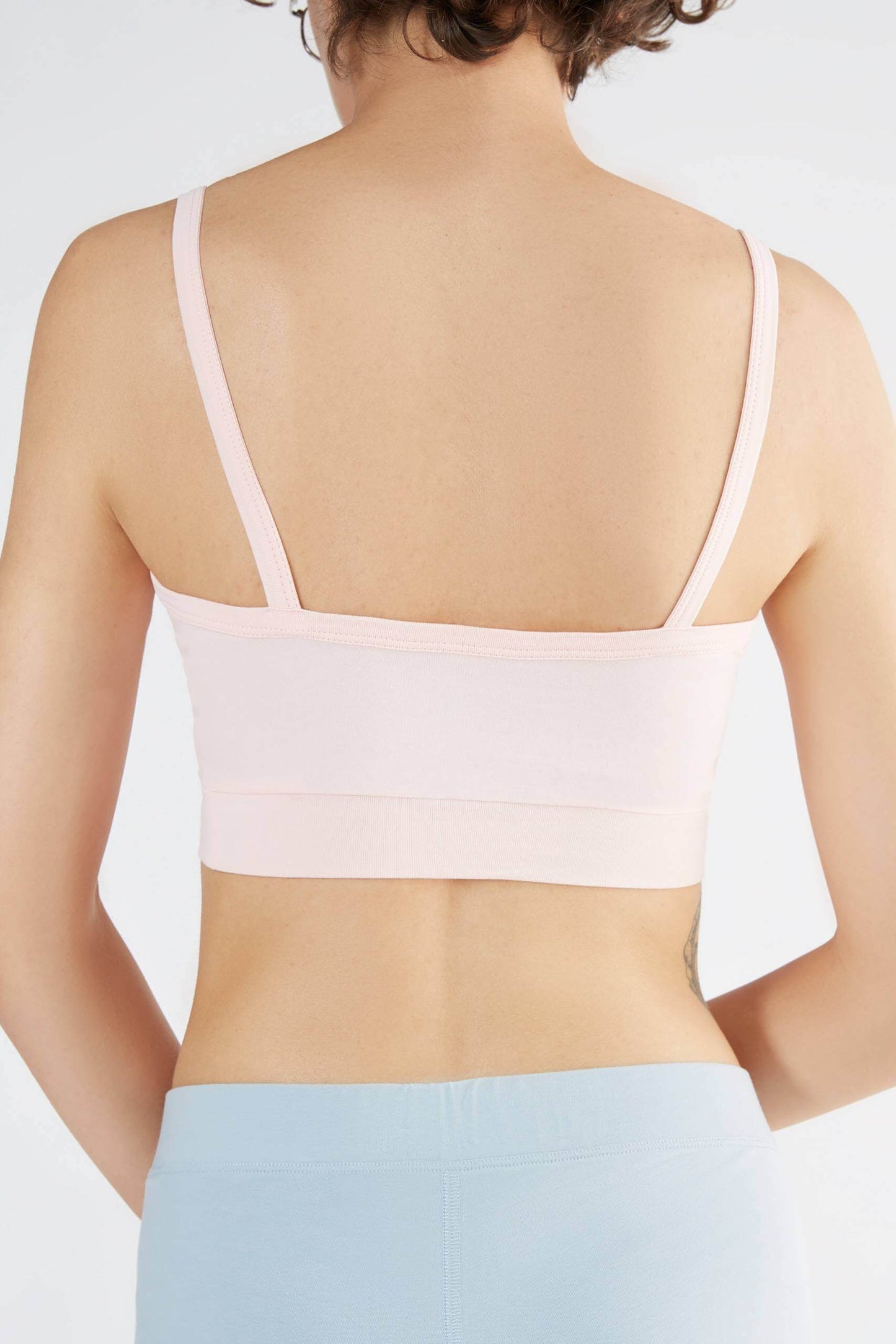 Women's bra with a supportive band, made from organic materials, shown on a plain background. Comfortable and eco-friendly lingerie from True North. 1511-036