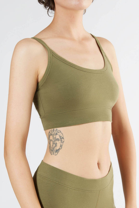 Women's bra with a supportive band, made from organic materials, shown on a plain background. Comfortable and eco-friendly lingerie from True North. 1511-041