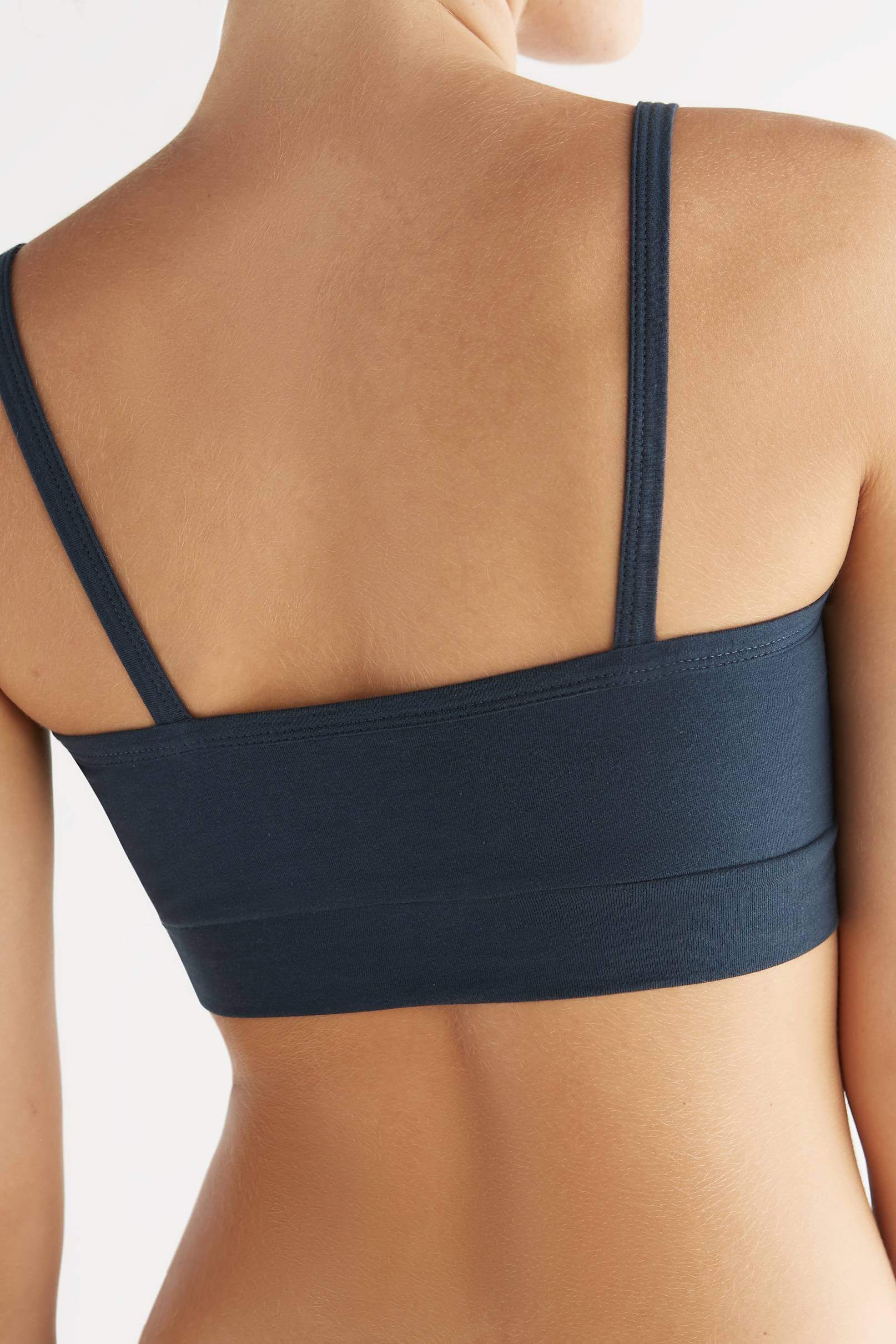 Women's bra with a supportive band, made from organic materials, shown on a plain background. Comfortable and eco-friendly lingerie from True North. 1511-048