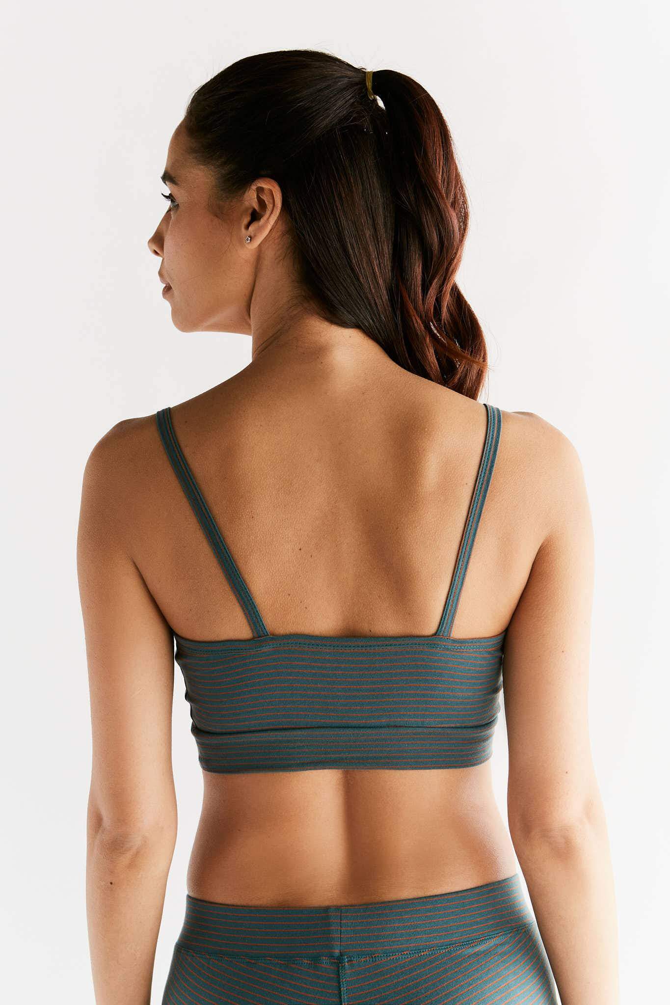 Women's bra with a supportive band, made from organic materials, shown on a plain background. Comfortable and eco-friendly lingerie from True North. 1511-064