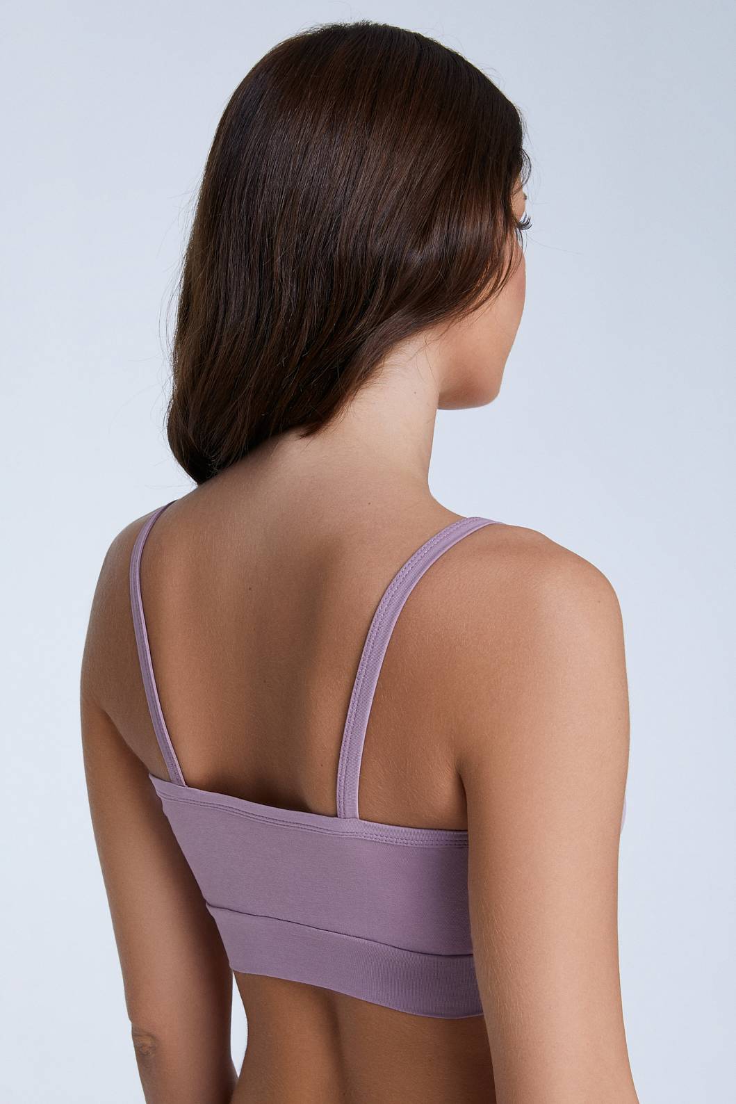 Women's bra with a supportive band, made from organic materials, shown on a plain background. Comfortable and eco-friendly lingerie from True North. 1511-080